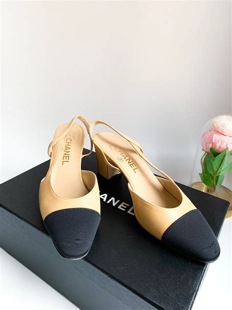 chanel beige and black shoes.